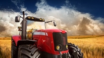 New Modern Tractor on the Barley Field in Sunset Light, Photomontage. See more pictures from my lightbox "On The Farm": 