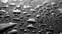 Water drops on metal surface. Abstract background