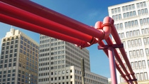 Close up of red pipes in city center Close up of red pipes in city center