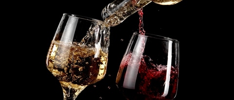 Red and white wine glasses pour