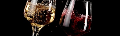 Red and white wine glasses pour