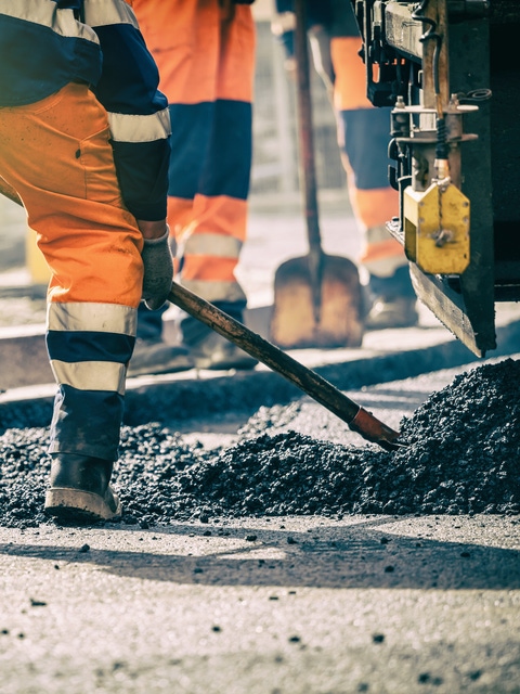 Teamwork, Group of workers on a road construction, team of people at work